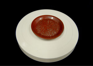 Gratte-ail rouge
